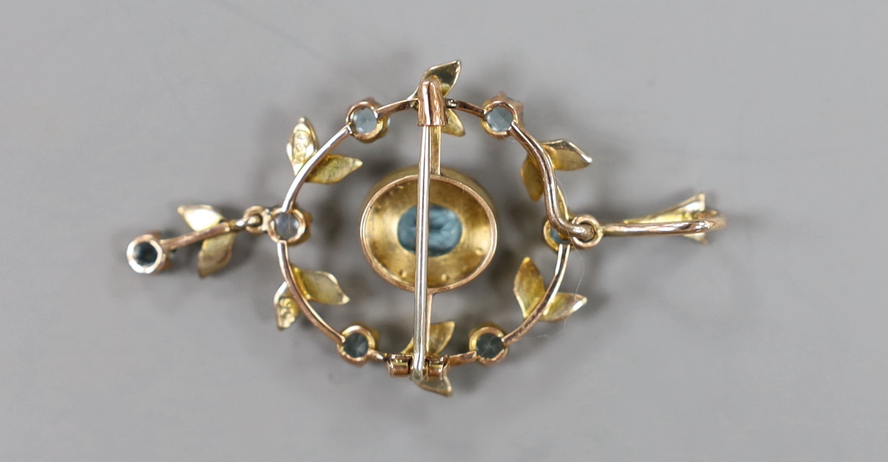 An Edwardian 9ct, blue paste and seed pear set drop pendant, 42mm, gross weight 4.6 grams.